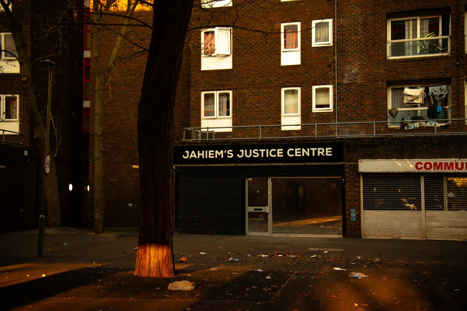 A shot of Jahiem's Justice Centre during the evening. The light is dim and the streets are desert.